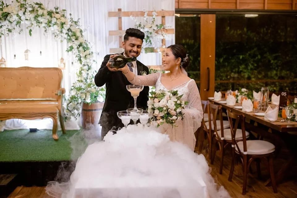 Newlyweds celebrating with a champagne toast at Vinrich Lake Resort