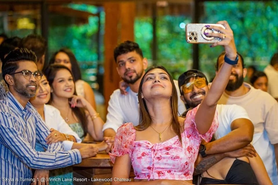 Guests taking a group photo at a celebration at Vinrich Lake Resort
